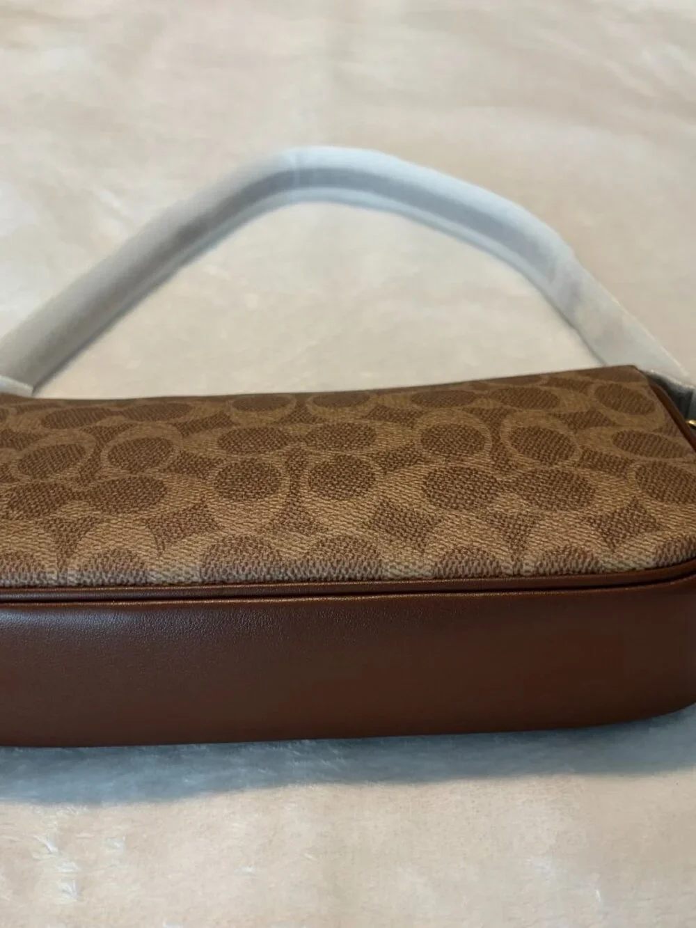 Coach pockets retail